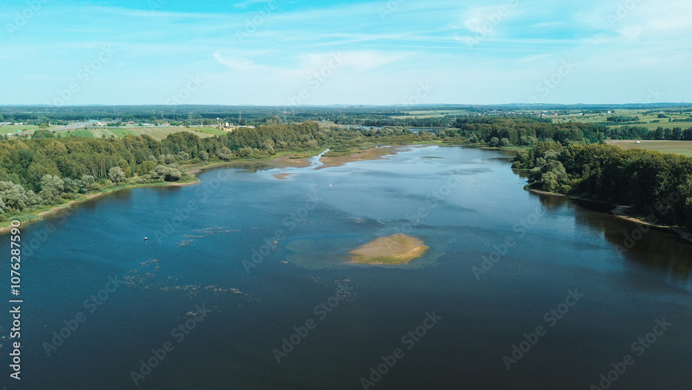 Fototapeta premium Quiet lake with scattered boats