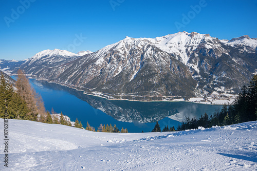 view to Rofan mountains and lake Achensee from ski run Pertisau tyrol. winter landscape austria. photo