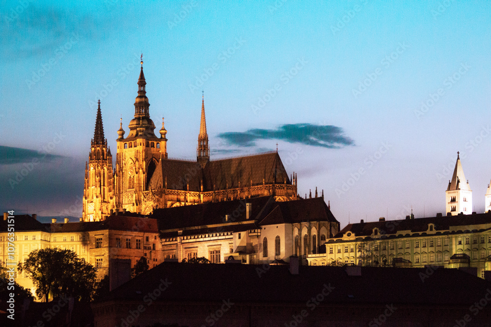Fototapeta premium Prague castle in the sunset with the Moon in the background.