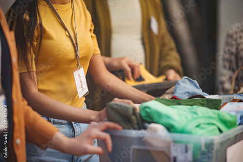 People donating and collecting clothes for charity