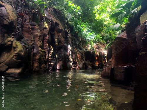 canyon of Riviere Moustique in petit Bourg, Basse terre, Guadeloupe. River between the stones canyon in the jungle. idyllic landscape 