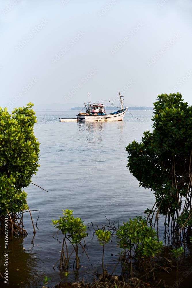 Serenity on the Water: A Lonely Boat in an Inlet
