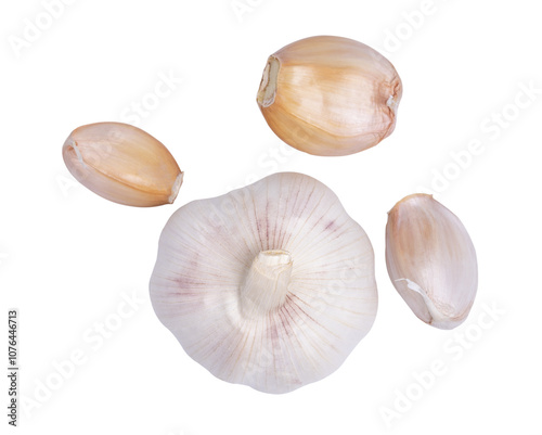 Top view fresh peeled garlic cloves on white background.