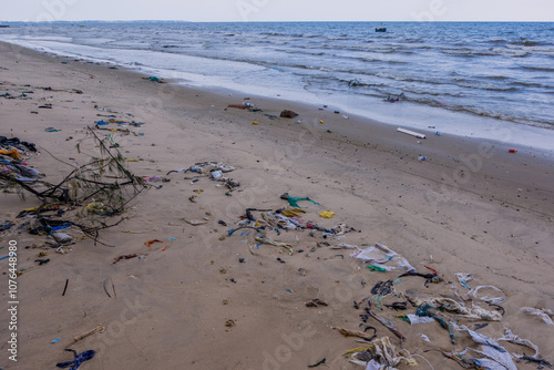 Trash and pollution on the beach of Mui Ne, Vietnam
