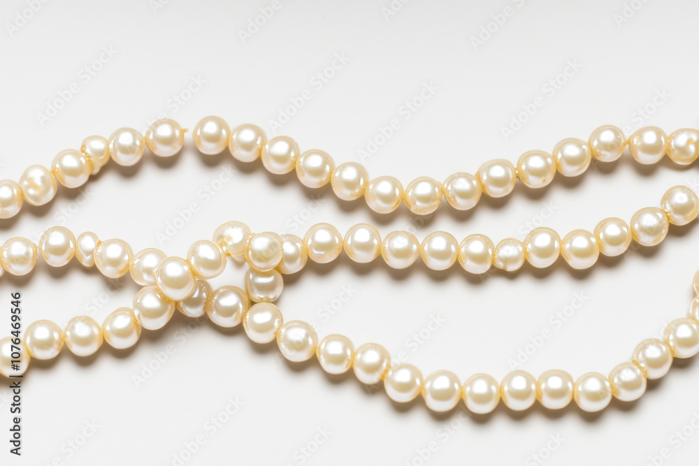 Necklace with pearls in on. beautiful luxury fashion concept. w in white with a necklace and pearls on a white. a w in white with a necklace and white for the holidays lifestyle. Necklace with pearls in on. beautiful luxury fashion concept. w in white with a necklace and pearls on a white. a w in white with a necklace and white for the holidays lifestyle.