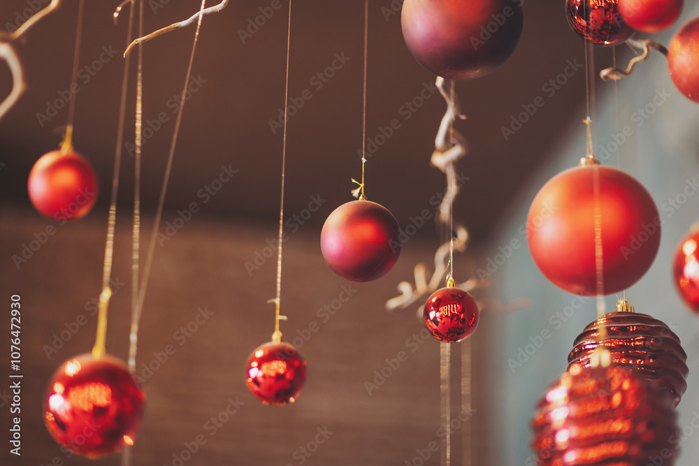 Fototapeta premium Christmas Decoration by red Christmas ball. New Year tree balls. assortment of brightly red frosted glass