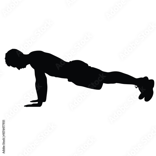 A man doing a push up. He is wearing shorts and a shirt