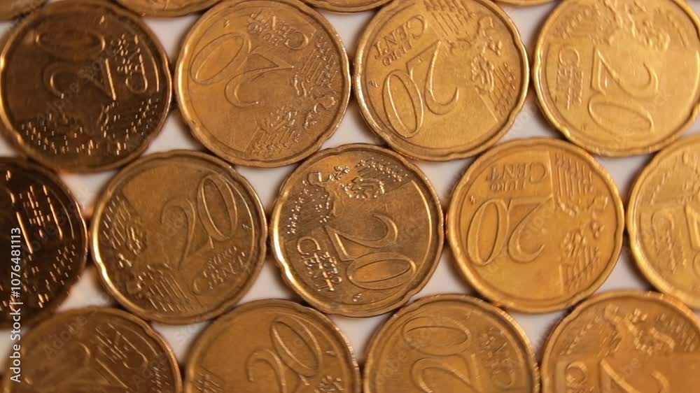 20 Euro Cent Coins, Rotating Money Background - Top View. Euro Money Currency. A Lot of Twenty Cent Cash. Golden Eurocents. Business, Finances and Money Saving Concept - Slow Rotation Right 20 Euro Cent Coins, Rotating Money Background - Top View. Euro Money Currency. A Lot of Twenty Cent Cash. Golden Eurocents. Business, Finances and Money Saving Concept - Slow Rotation Right