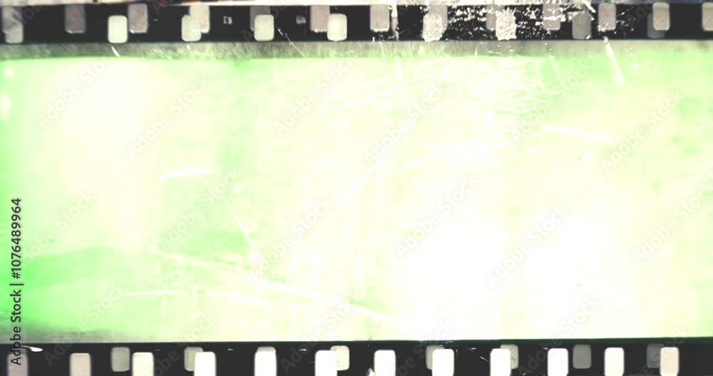 film strip transition, with chroma key green screen background, effect of old film rolling with details, scratches and grain, vintage strip intro