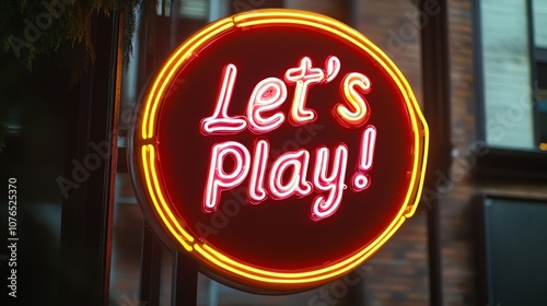 A neon sign displaying the words "Let's Play!" in pink and blue lettering.