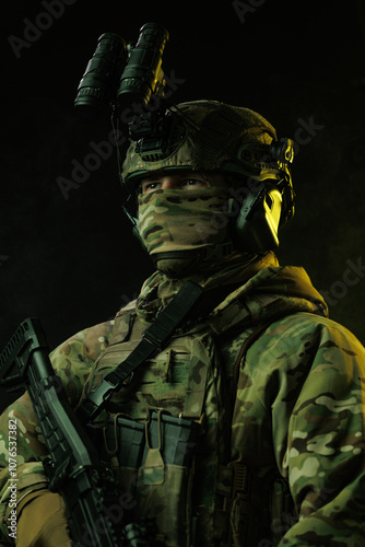 Portrait of Soldier in Tactical Gear with Night Vision Goggles and Rifle