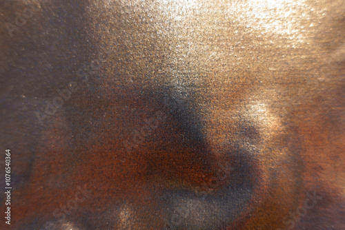 Background - shiny bronze nylon and spandex lame fabric