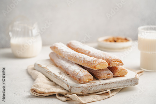 Fartons, typical sponge pastries of Valencia, Spain, made to be dipped in horchata or hot beverages like chocolate or coffee photo