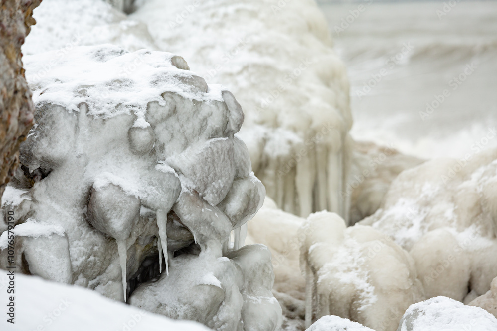 Icy constructions in the sea in winter Icy constructions in the sea in winter