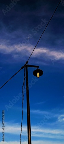 lamp post with beautiful blue clouds background