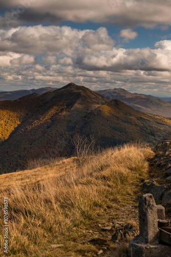 Fototapeta Naklejka Na Ścianę i Meble -  Under the Autumn Sky: Bieszczady's mountains Rolling Hills