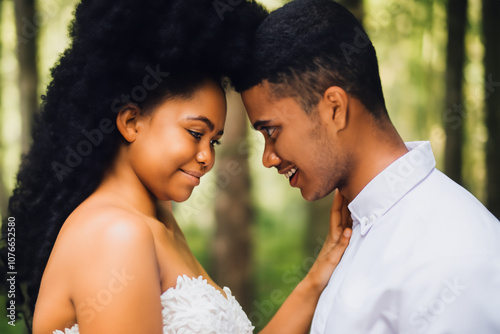 Couple at a wedding the green of a forest. nature marriage rtic concept. happy couple with groom and bride in the forest in summer. happy couple at wedding in the green forest in lifestyle summer. photo