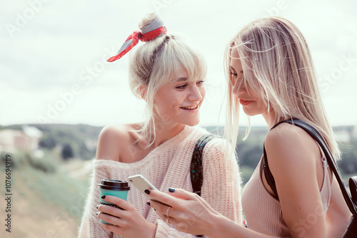 young woman make selfie, posing in the street, outdoor portrait, hipster style, cute, like, photo, happy face, sisters, together, happy face, close up fashion model, woman using smartphone, sunglasses