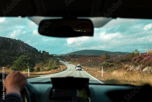 view from the windshield of the car on the road.through the mountains