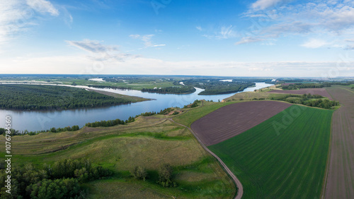 Aerial View of River Valley and Farmland Landscape