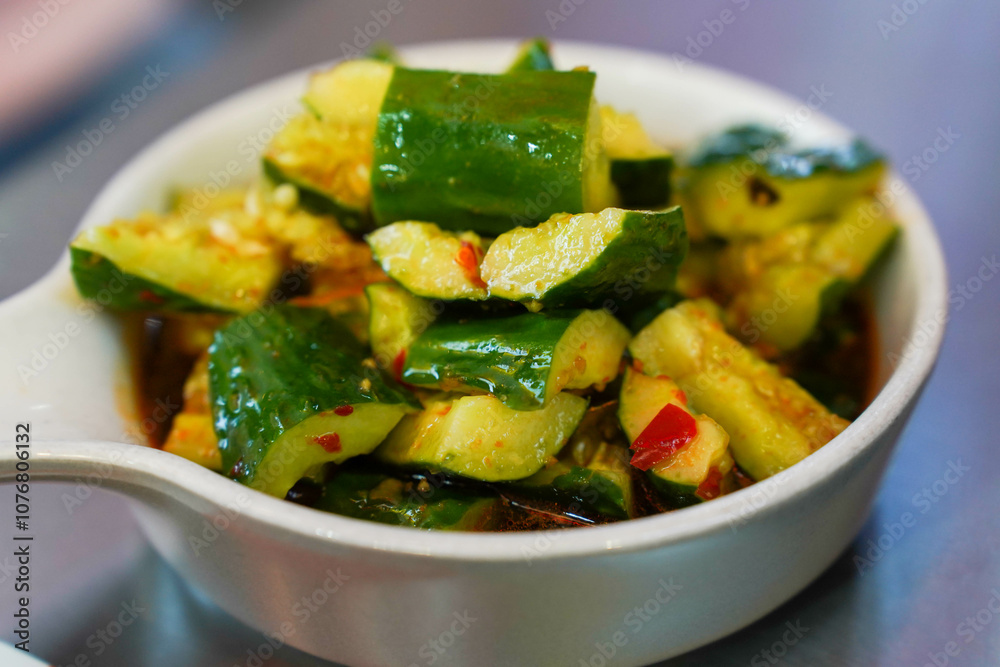 Chinese smashed cucumber salad with chili peppers