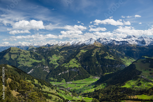 Breathtaking View of Alpine Peaks and Valleys from Stanserhorn Switzerland