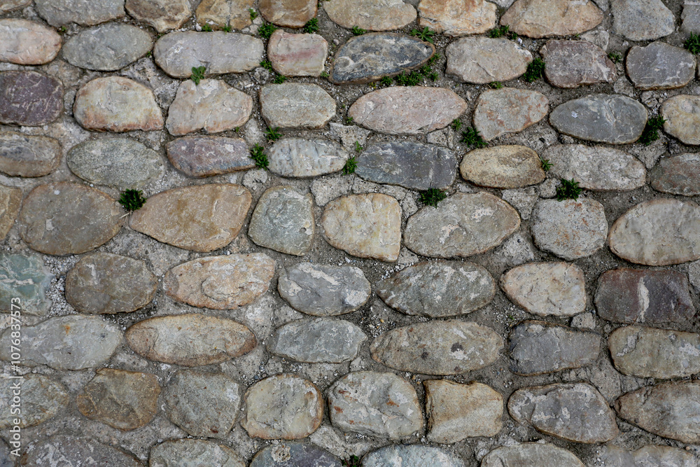 Obraz premium Sol en galets dans une rue 