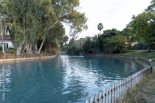 Canvastavla blue stream in kibbutz Israel with trees