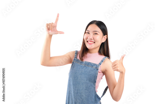 Cheerful young woman making gestures with hands, smiling and posing against white background. photo