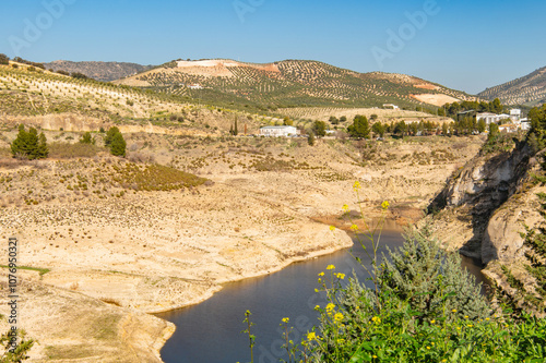 View of the Iznajar reservoir or Embalse de Iznajar. Córdoba province, Andalusia, Southern Spain. Dam, artificial lake. Store of fresh water. photo