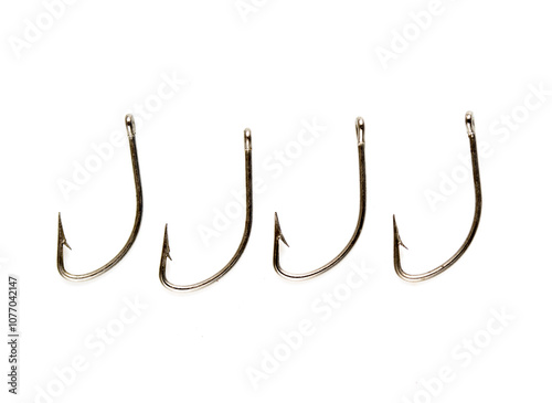 Steel fishing hooks on a white background photo