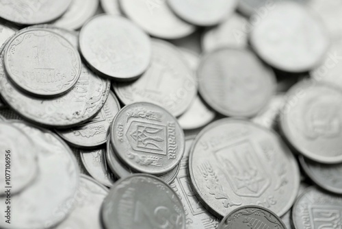 Big pile of different coins from various time period in Ukraine. Shiny Ukrainian money background photo