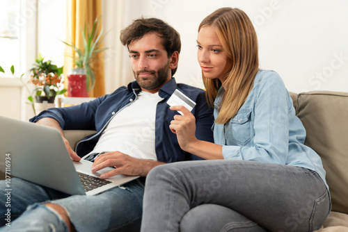 Couple with credit card, internet shopping