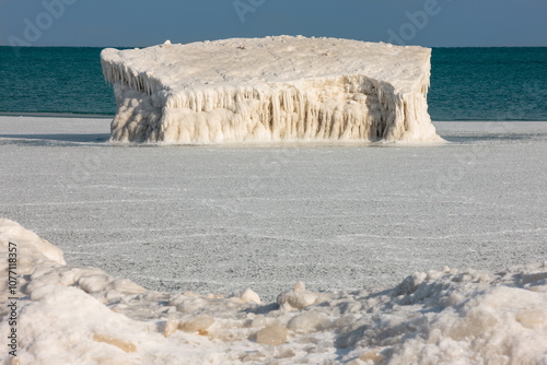 Naturally formed ice island just off the beach in Lake Michigan at Harrington Beach State Park, Belgium, Wisconsin, formed during the 2014 January polar vortex. photo