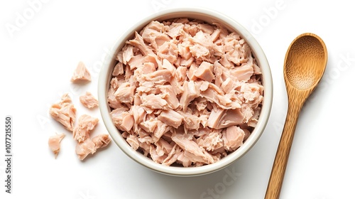 Cooked tuna flakes simple white ceramic porcelain bowl top down view wooden spoon white background, fish, seafood, canned food