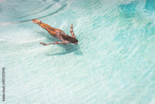 Woman swimming in a pool 