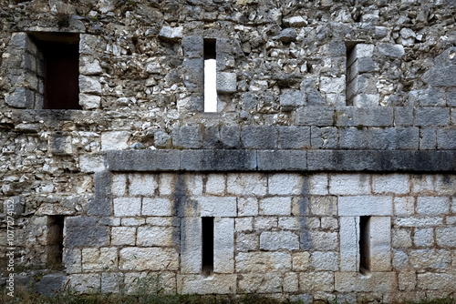 Tagliata delle Fontanelle:the perimeter wall of the 19th century fortress with rifle loopholes. Fastro Bassanese, Valbrenta, Veneto, Italy.