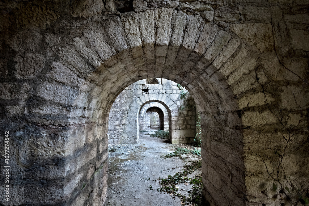 Tagliata della Scala: interior of the 19th-century fortress with vaulted portals between artillery casemates. Primolano, Valbrenta, Veneto, Italy.