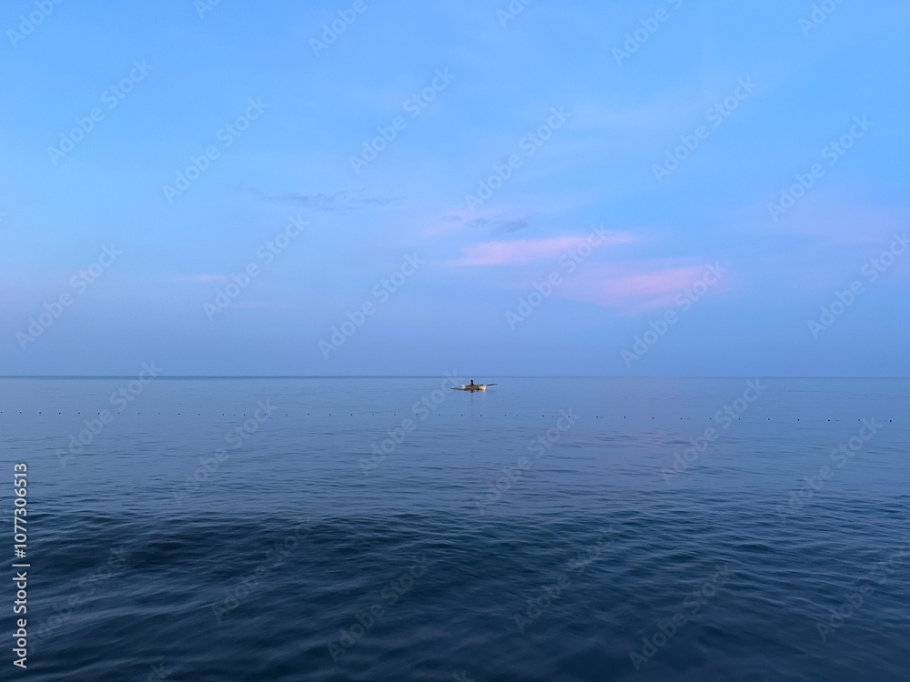 Fototapeta premium Man on a boat 