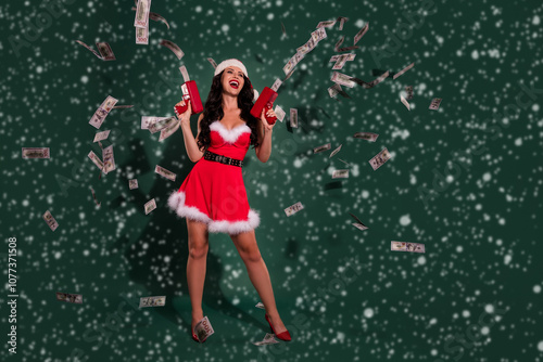 Quadro su tela Photo of funky impressed lady santa dressed red outfit shooting money gun lookin