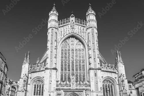 Bath, Somerset, England, UK: Githic facade of Bath Abbey, the Abbey Church of Saint Peter and Saint Paul in black and white photo