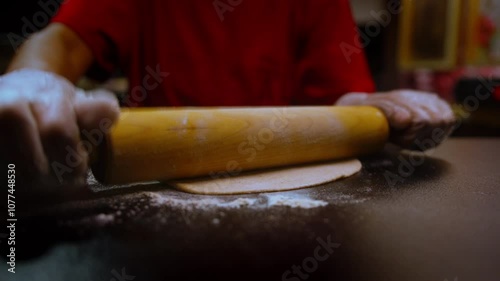 Rolling out dough in a professional kitchen