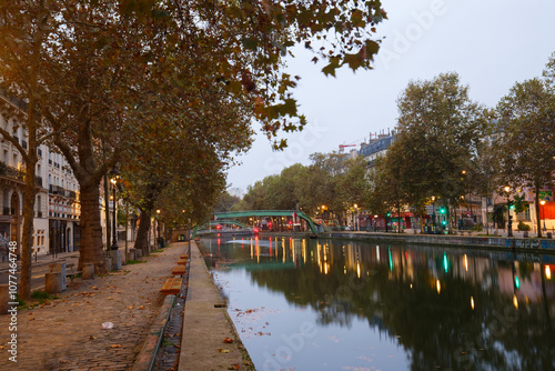 The Canal Saint-Martin at night .It is long canal connecting to the river Seine, Paris, France. photo