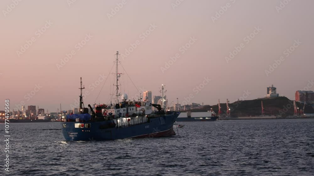 Fishing boat on the background of the city, sunset, Fishing boat on the background of the city, sunset,