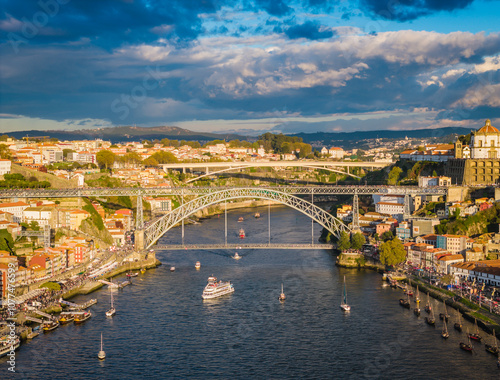 Aerial drone view of Dom Luis I Bridge over Douro river and panoramic Porto view. Portugal city landscape