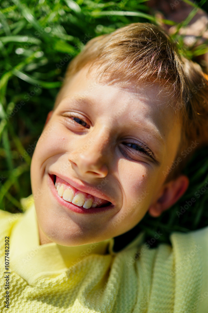 Portrait Boy Enjoying Sunshine in the Grass Portrait Boy Enjoying Sunshine in the Grass