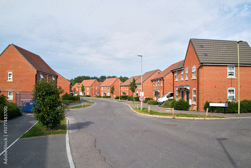 New housing development in a quiet residential neighborhood New housing development in a quiet residential neighborhood