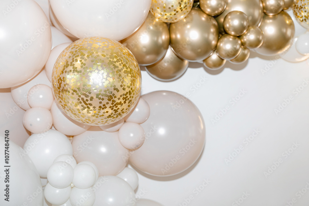 White and gold balloons with confetti on a white background are creating an elegant and festive atmosphere. Background. Festive background. White and gold balloons with confetti on a white background are creating an elegant and festive atmosphere. Background. Festive background.