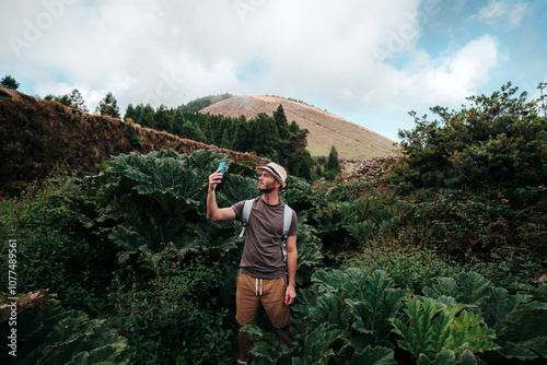 Tourist taking pictures in nature