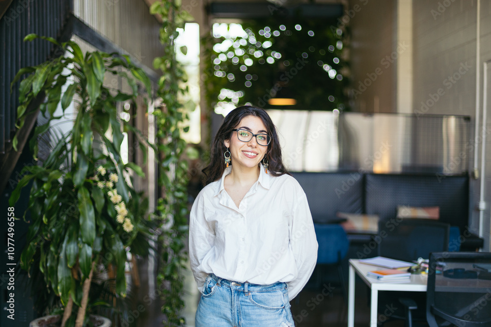 Portrait of a young businesswoman in a coworking space Portrait of a young businesswoman in a coworking space